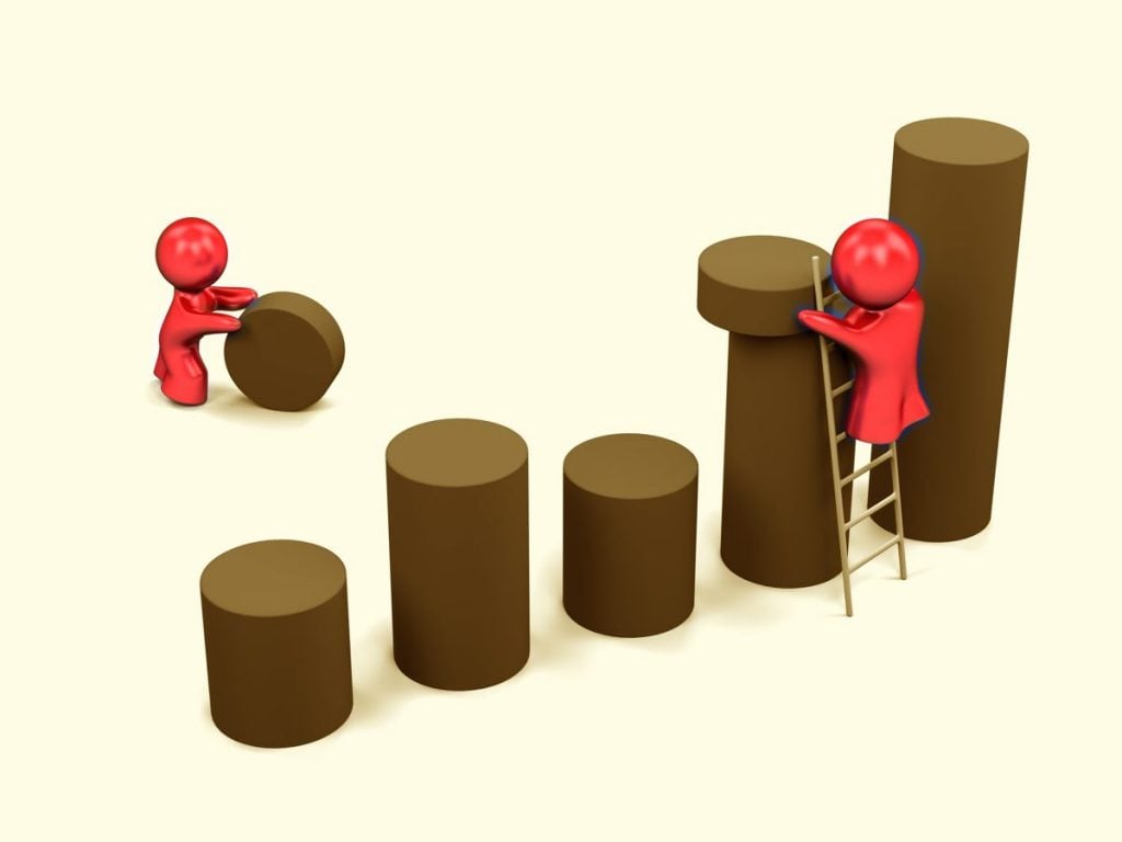 two people working hard to maximize company results