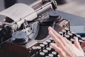 a typewriter to symbolise writing stories as one of the top job hunting tips