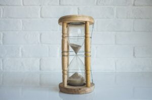 an hourglass to symbolise checking your firm is solvent when you do your due diligence on a firm