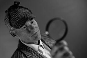 a man with a magnifying glass