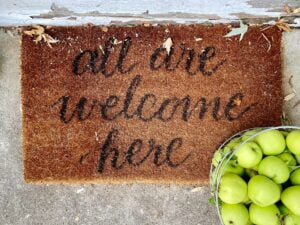 a door mat to symbolise not letting colleagues walk all over you